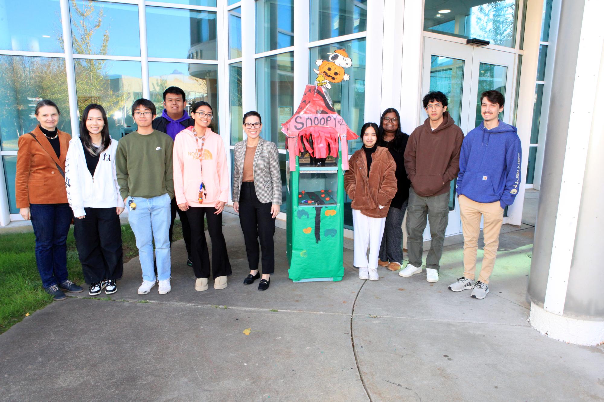 Pictured, from left to right, are club co-advisor Alina Ciscel, member Tuy Dang, club vice president Kenny Nguyen, member Richard Escobar in the back, club president Leesa Cabrera, CEO Esposito, club member Lay Jennifer Yunus, club secretary Brianna Biswas and club members Devon Nguyen and Adison Graves. 