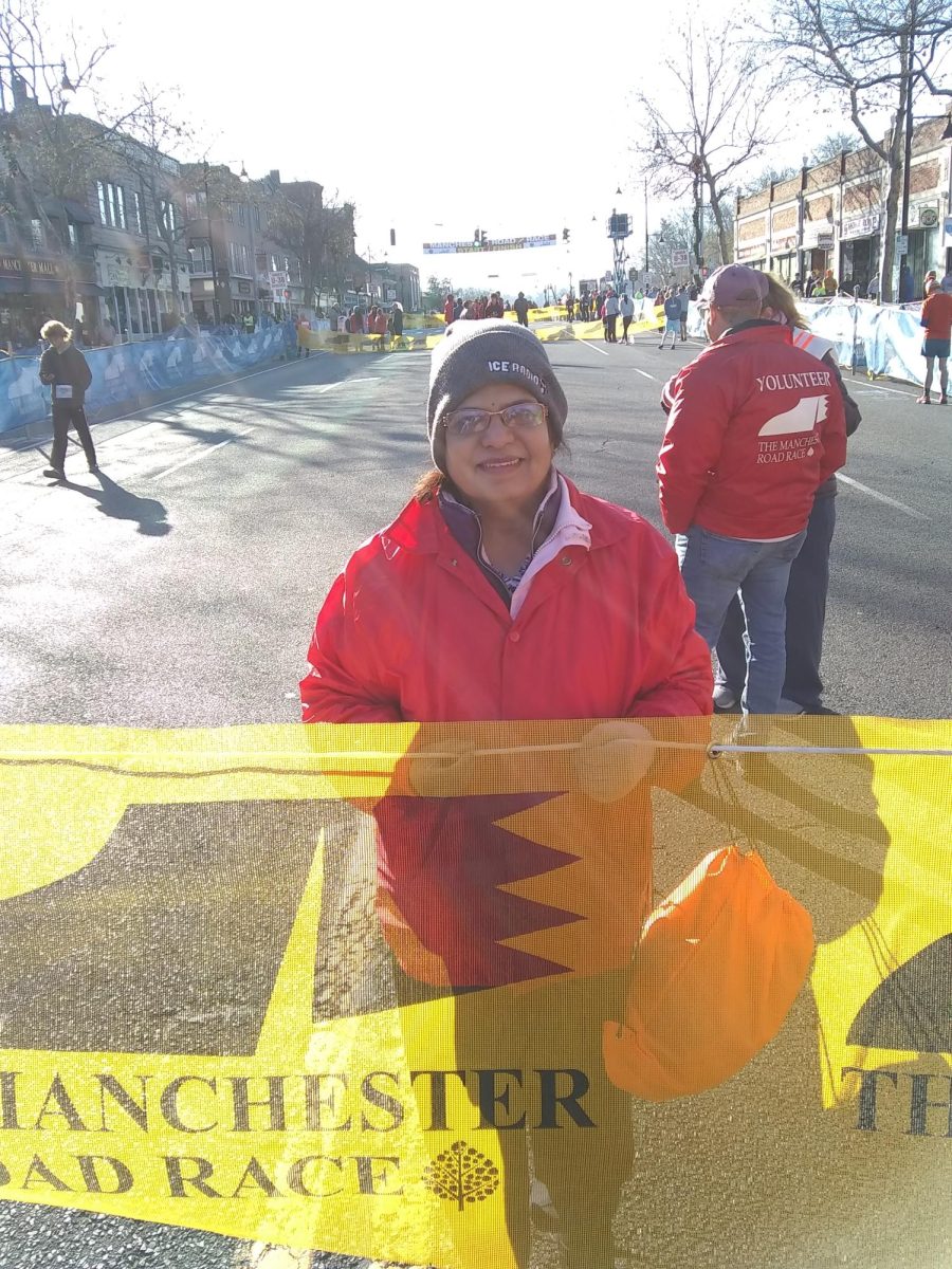 CT State Manchester staff member Geeta Khade has been volunteering for the Manchester Road Race for more than 10 years.