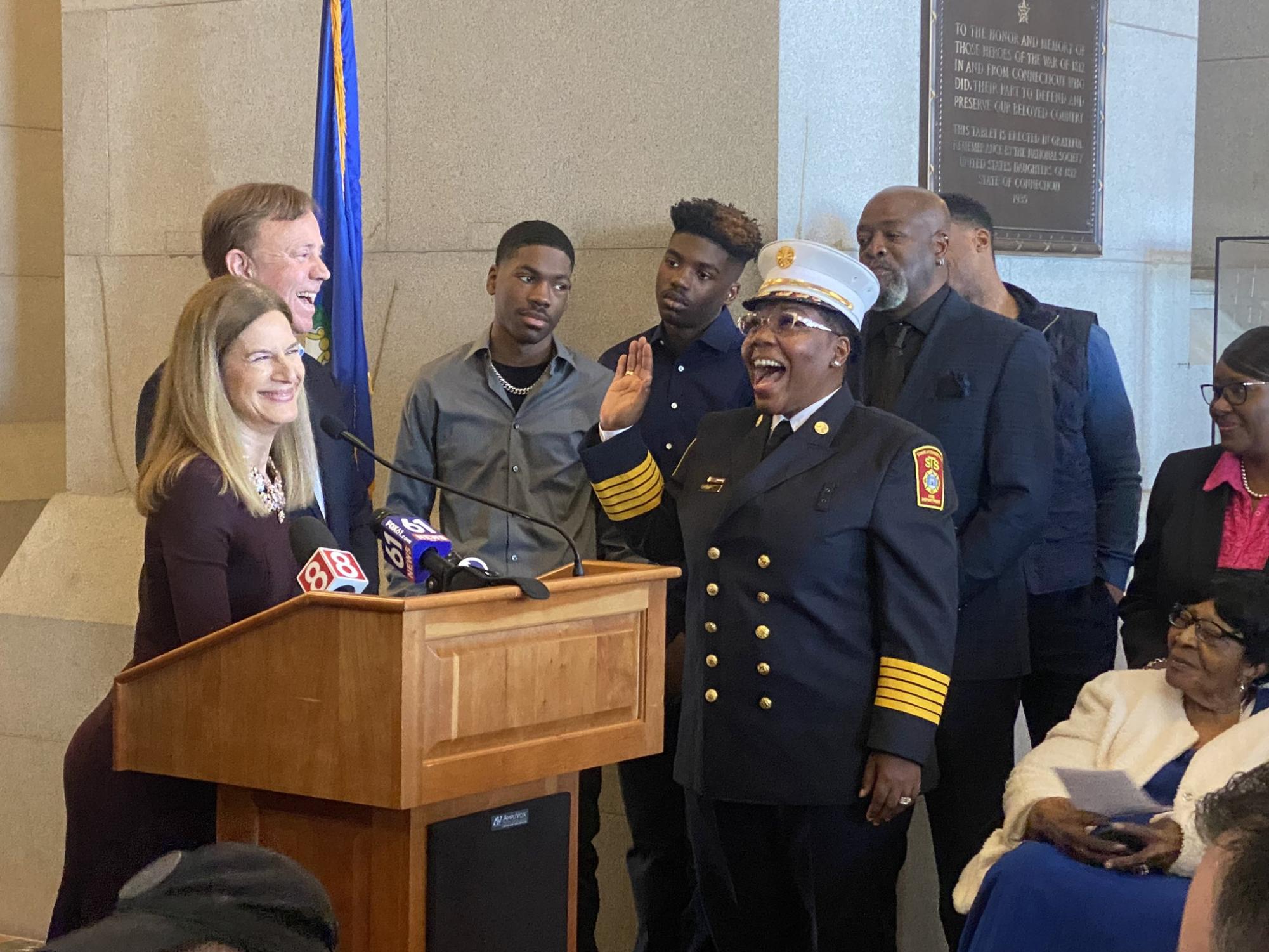 Shelly L. Carter being sworn in as New Englands first Black female fire chief on March 29, 2023. 