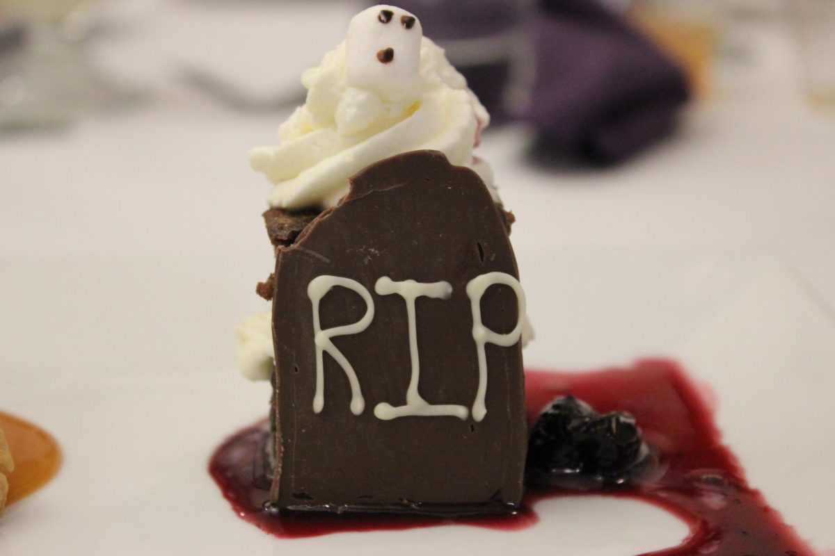 A "Haunted Tombstone Brownie" with cherry compote and whipped cream ended the Halloween Buffet Dinner on Oct. 30.