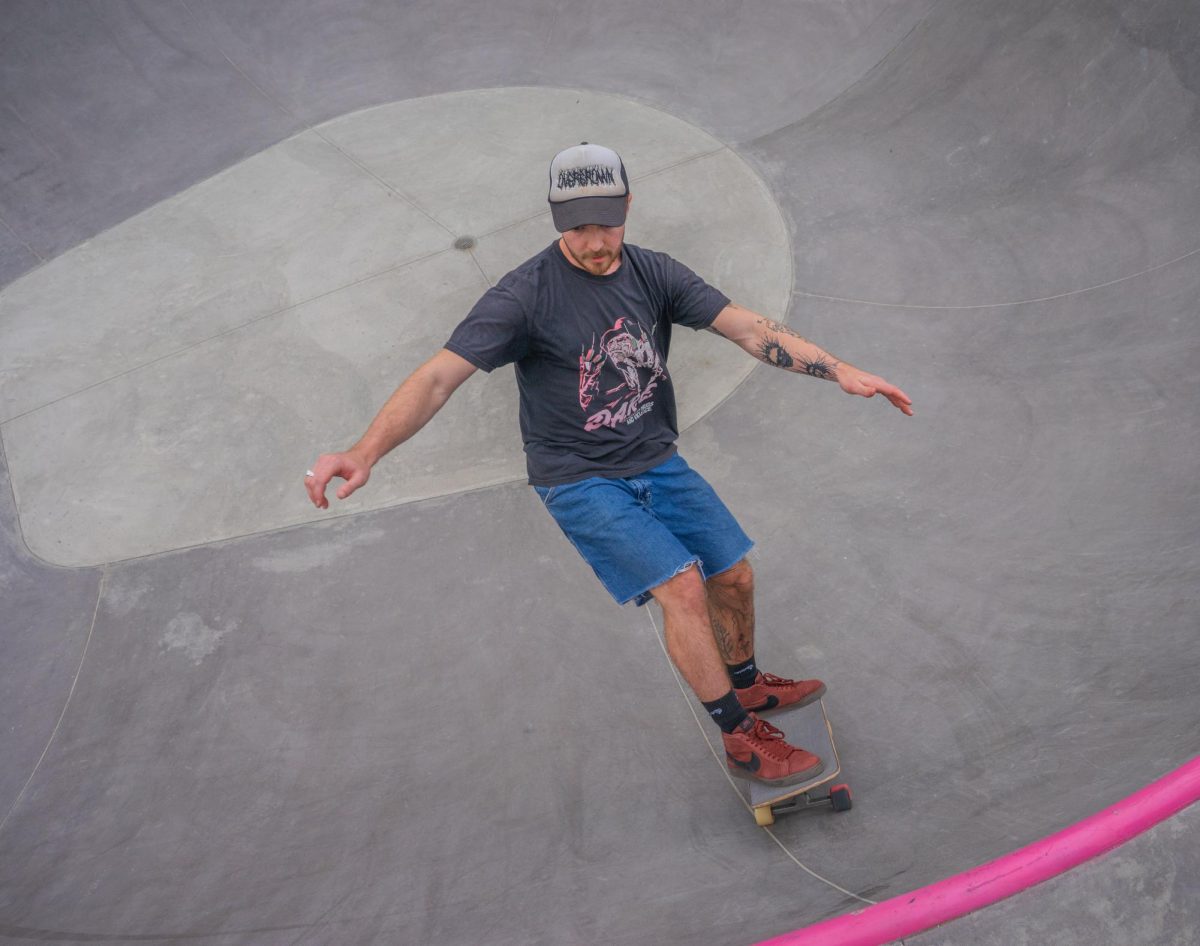 Local skater Logan Martin stabilizes himself after a trick.