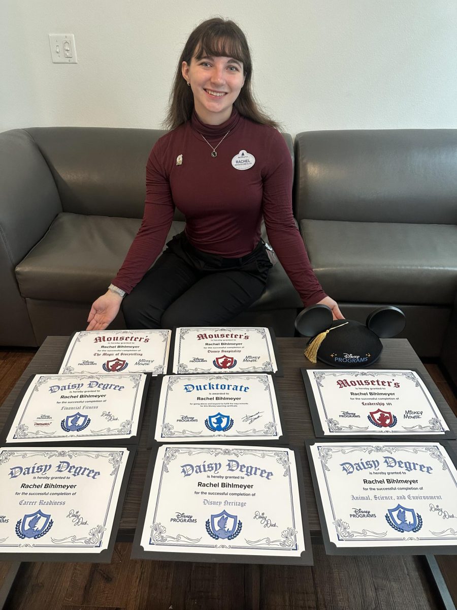 During her 7 months at Disney World Rachel earned 8 degrees in skills like Career Readiness, Financial Fitness, and Leadership 101. The "Ducktorette" is for completing over 50 Learning Hours. 