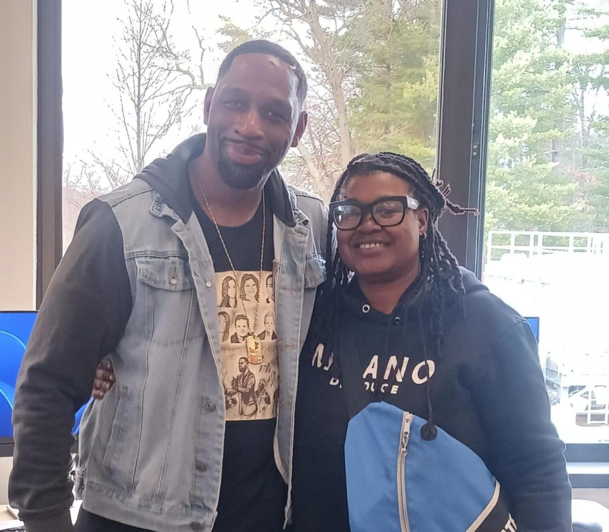 Michael Howard, aka "Mike Nice," visited the campus March 11 to discuss his career as an interviewer and commentator of all things ESPN.  Several students, including Monique Frazier, above, attended the event.