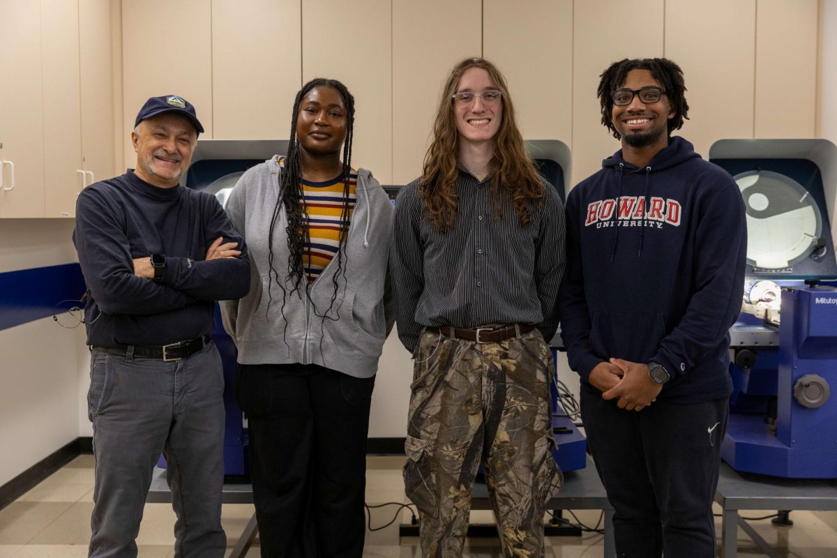 The 2026 Manchester Sky Knights team includes, from left, advisor Mehrdad Faezi, and students Elhame Adam, Bradley Carlson and Marcelus Brown.